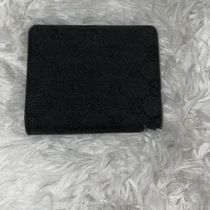 Authentic preloved black canvas GUCCI bifold wallet